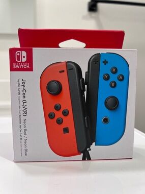 Nintendo Joy‑Con Controllers in Neon Red and Neon Blue